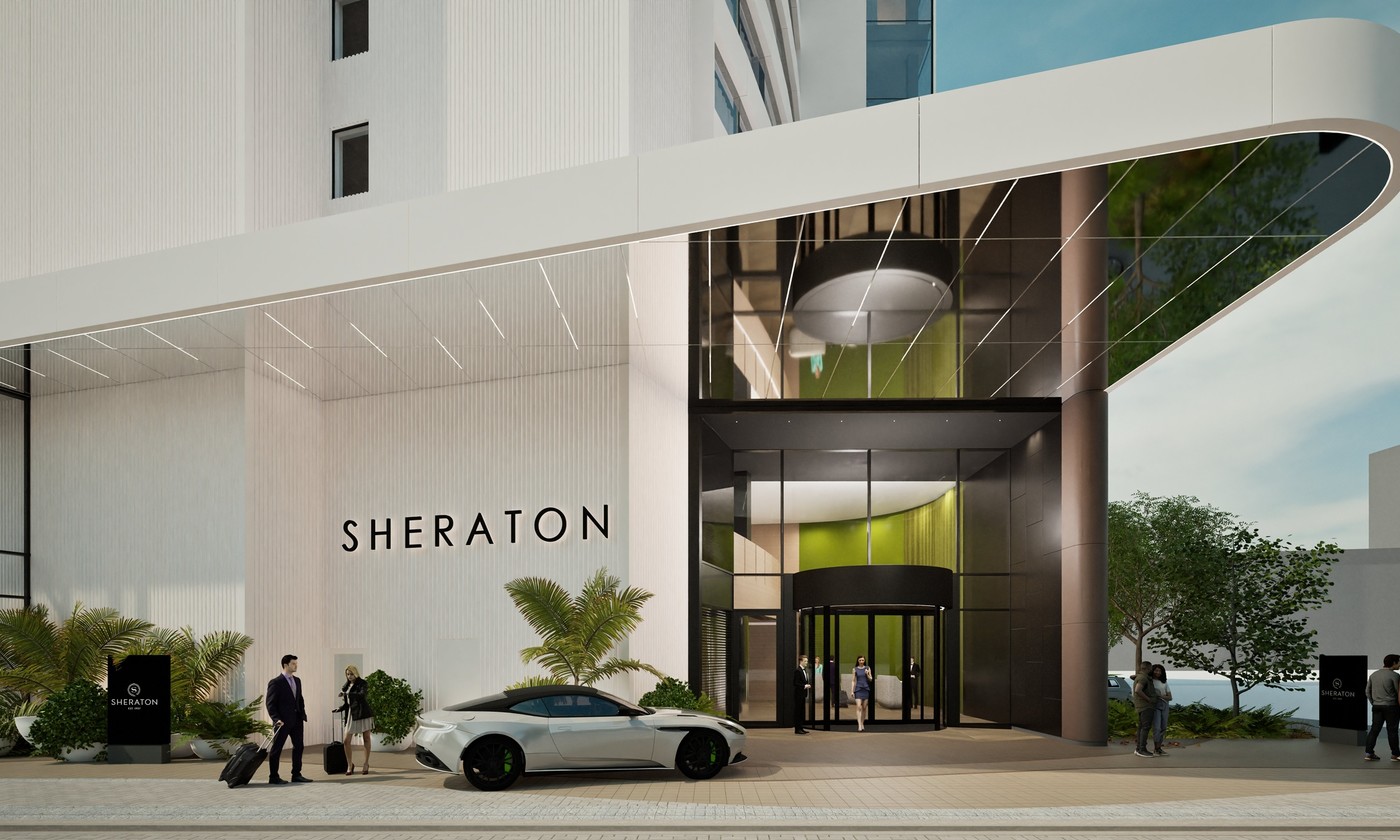 Luxury hotel with glass facade and rooftop bar— designed by Dalman Architects